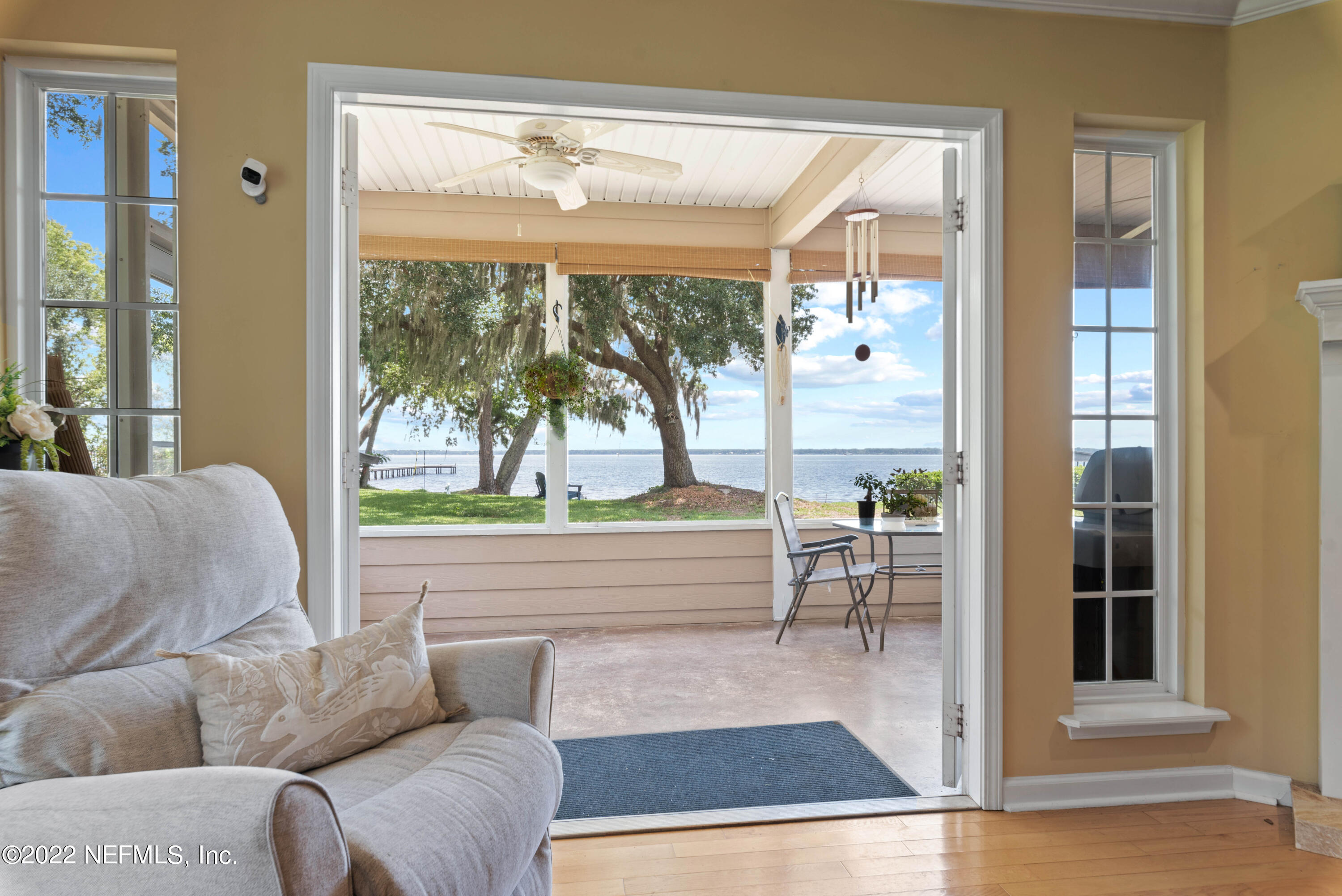 5345 Pine Avenue Fleming Island, FL 32003 - Photo 11 of 39 a living room with furniture and a large window