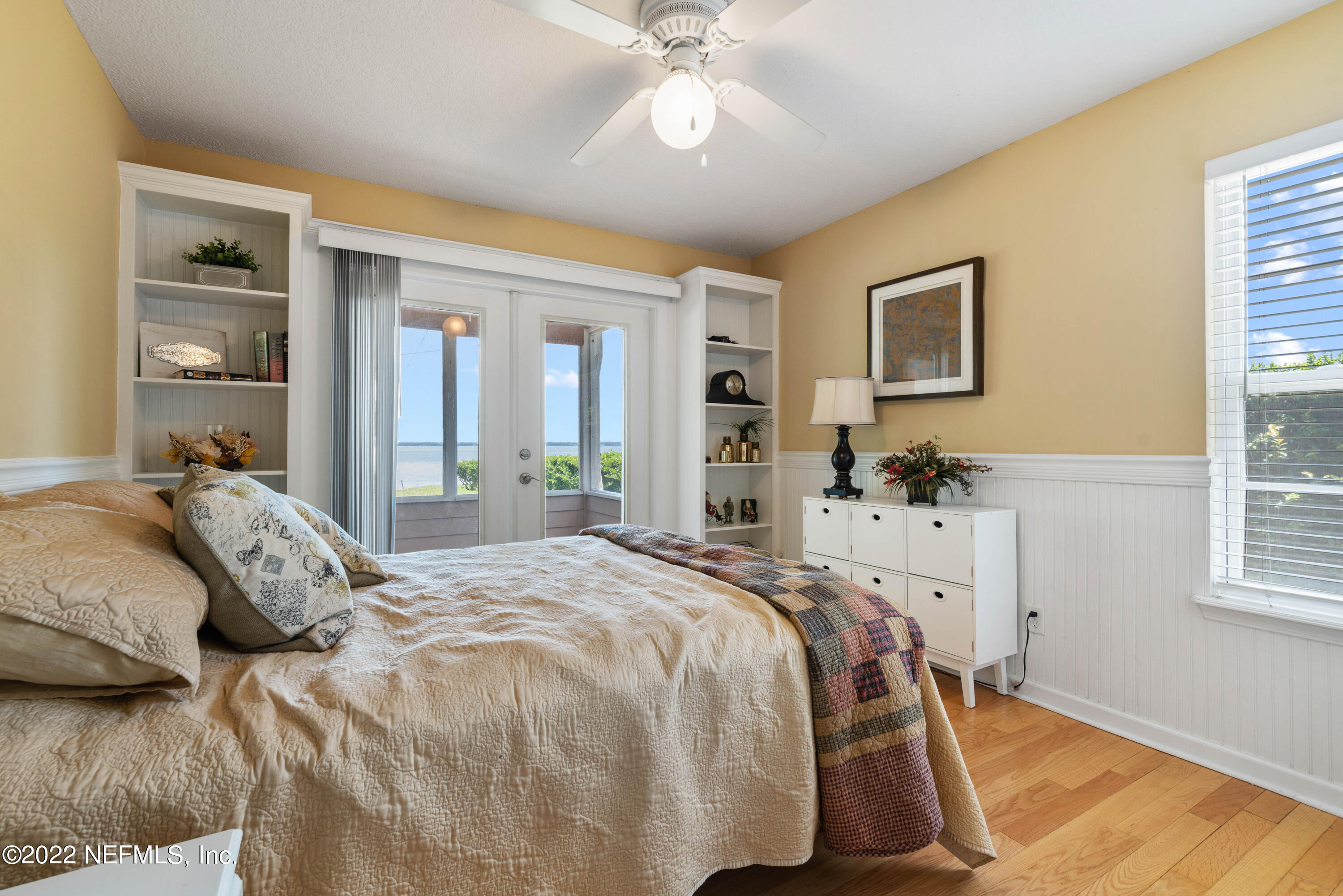 5345 Pine Avenue Fleming Island, FL 32003 - Photo 17 of 39 a bedroom with a bed and a window