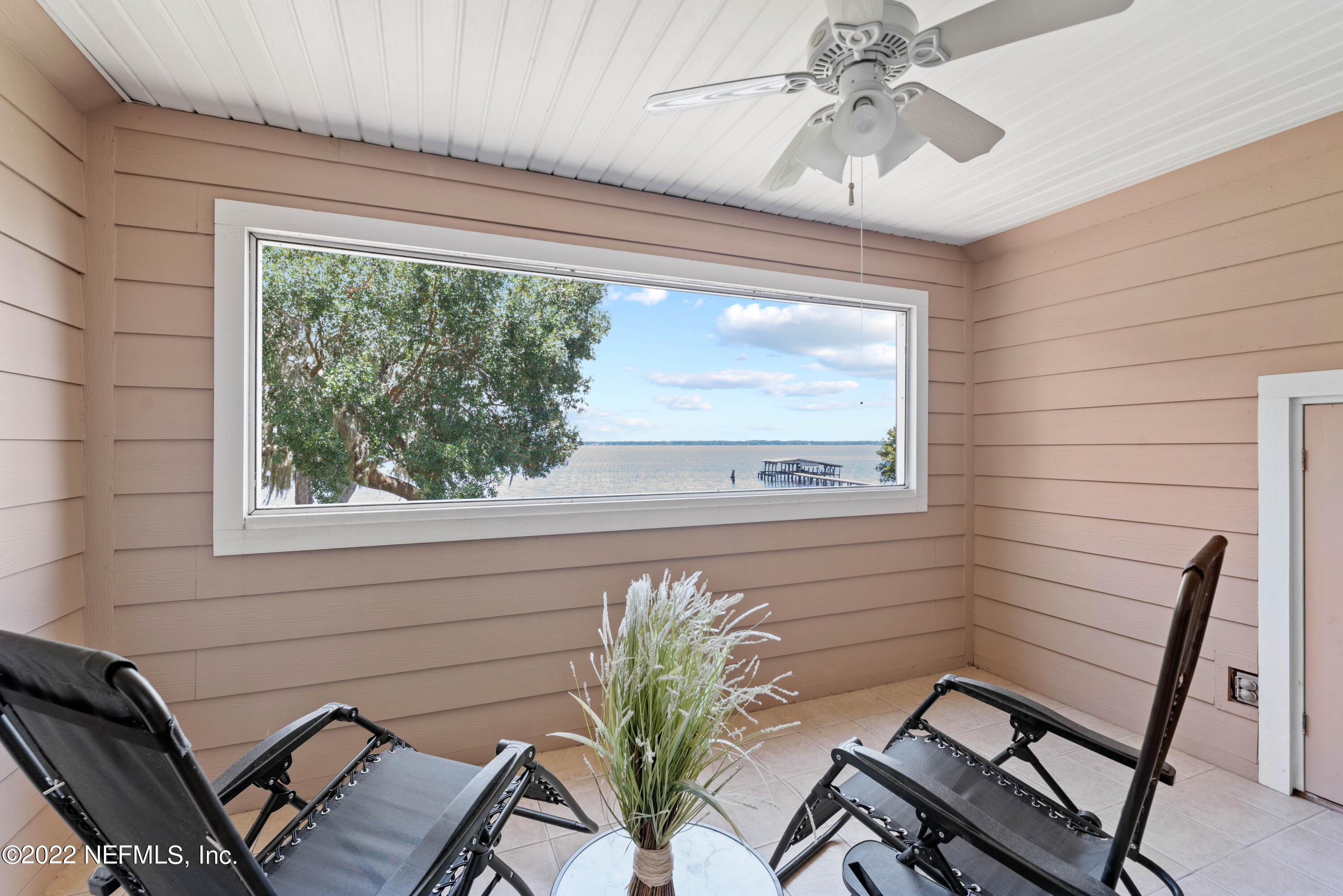 5345 Pine Avenue Fleming Island, FL 32003 - Photo 24 of 39 a view of a room with furniture and a window