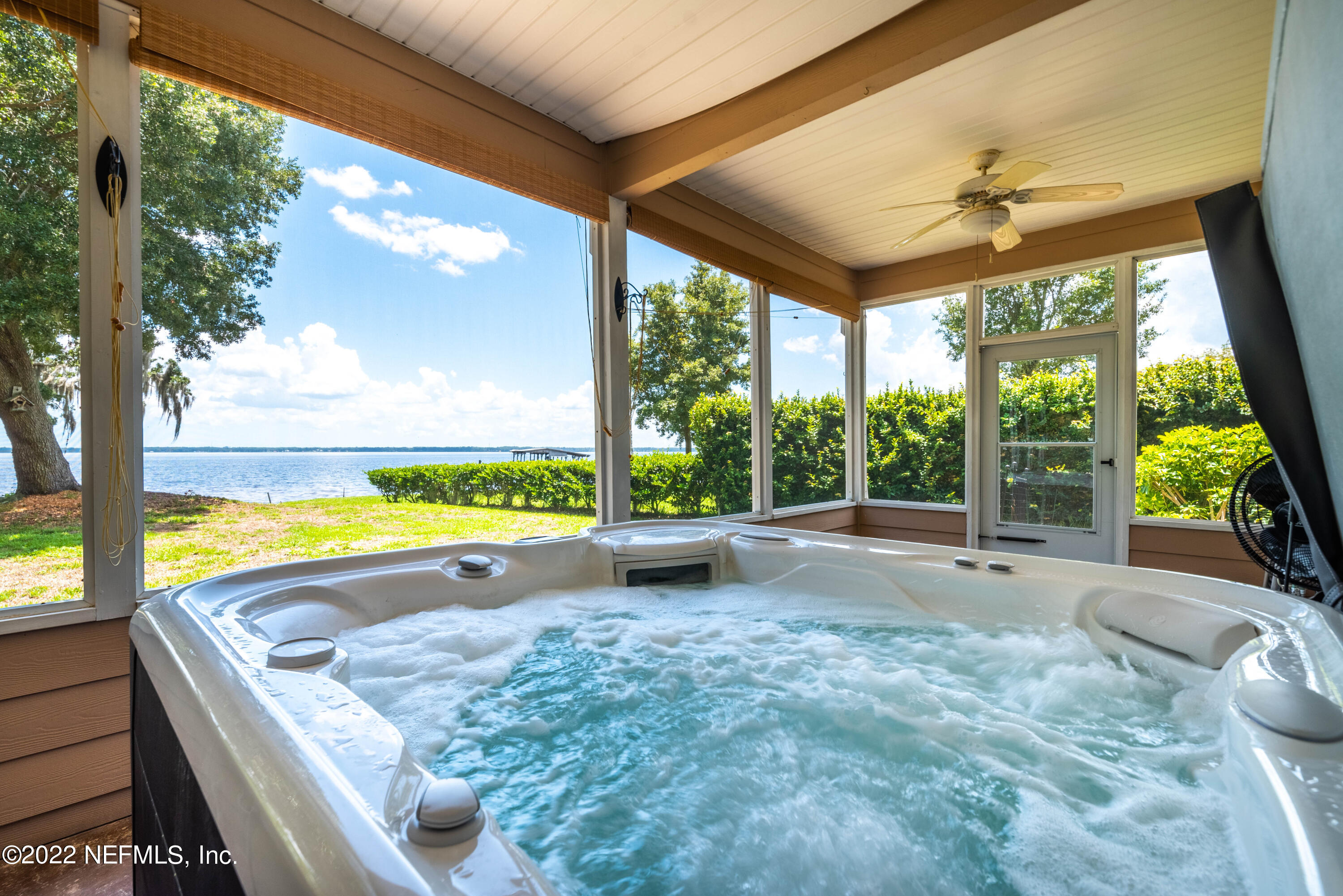 5345 Pine Avenue Fleming Island, FL 32003 - Photo 31 of 39 a view of swimming pool with seating area and garden