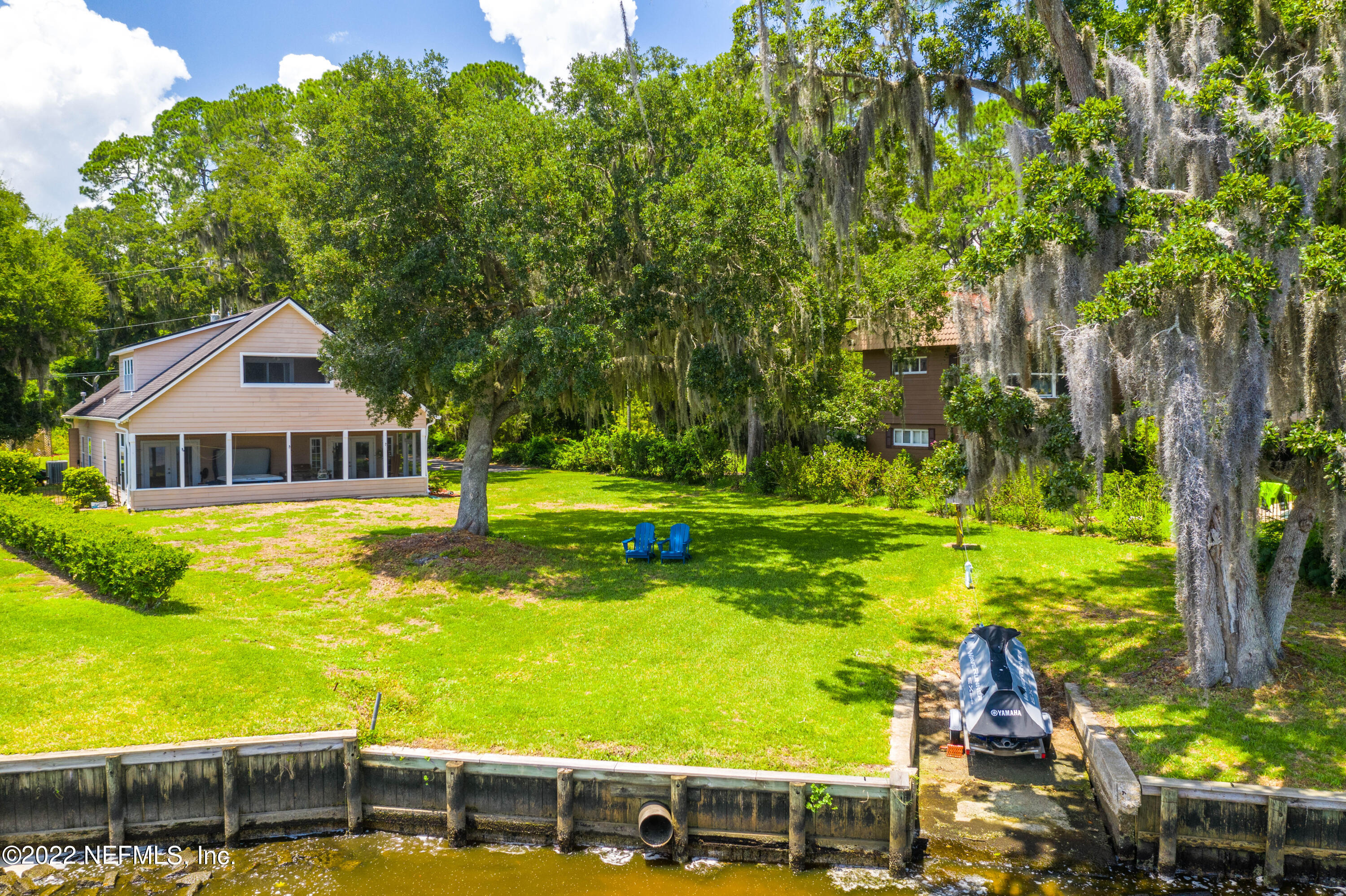 5345 Pine Avenue Fleming Island, FL 32003 - Photo 34 of 39 a front view of a house with a yard