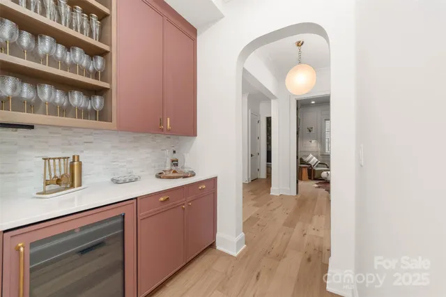 a bedroom with bed and window
