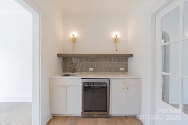 a patio with a table and chairs