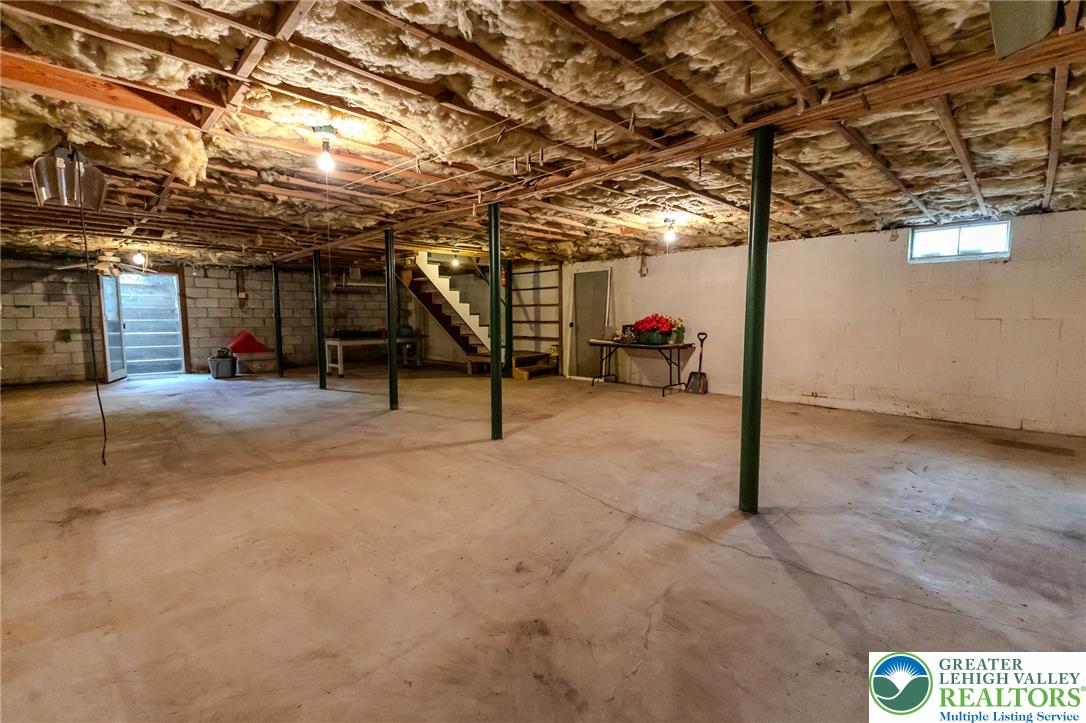 40 Locke Heights Road Bangor, PA 18013 - Photo 28 of 28 A spacious, unfinished basement offers extensive storage and future potential.