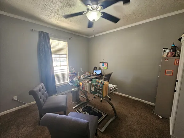 a room with furniture and windows
