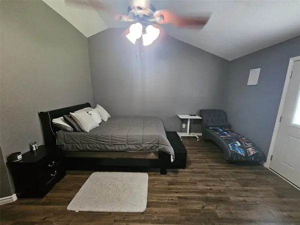a view with a double vanity sink mirror and window