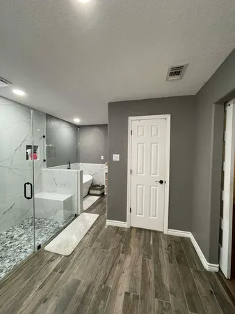 a bathroom with a sink and mirror