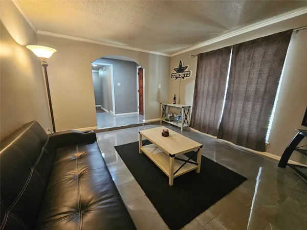 a bedroom with a bed and a mirror