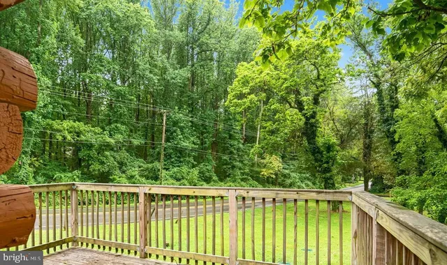 a view of a balcony with a pot