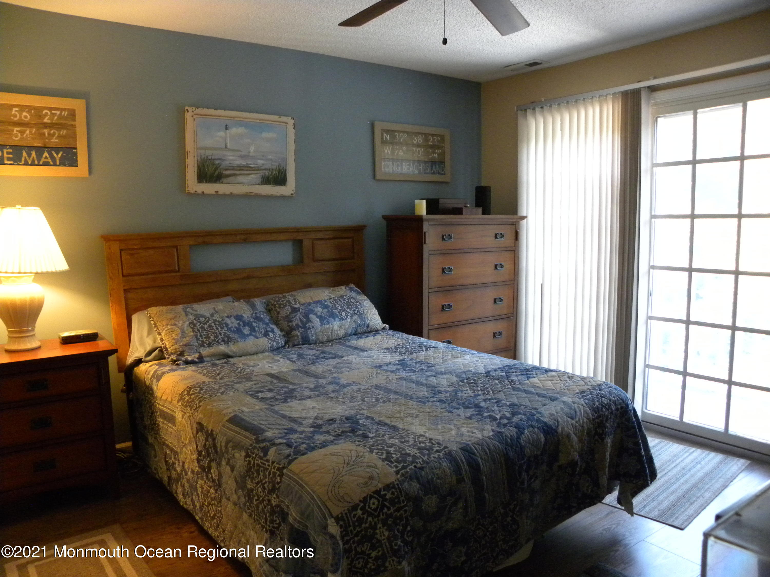 337 Lacey Road, Unit 37 Forked River, NJ 08731 - Photo 14 of 34 a bedroom with a bed and a window