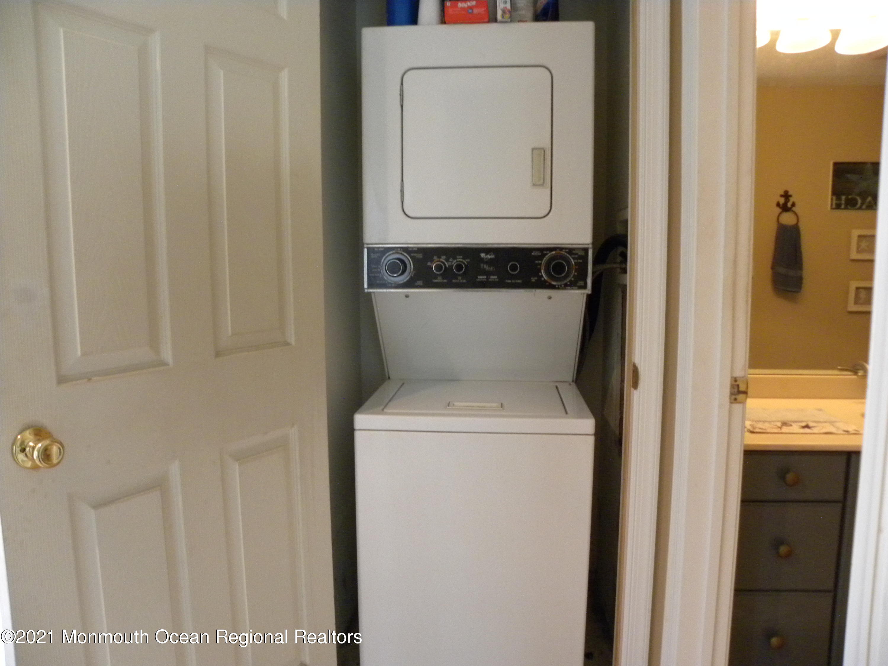 337 Lacey Road, Unit 37 Forked River, NJ 08731 - Photo 17 of 34 a utility room with dryer and washer