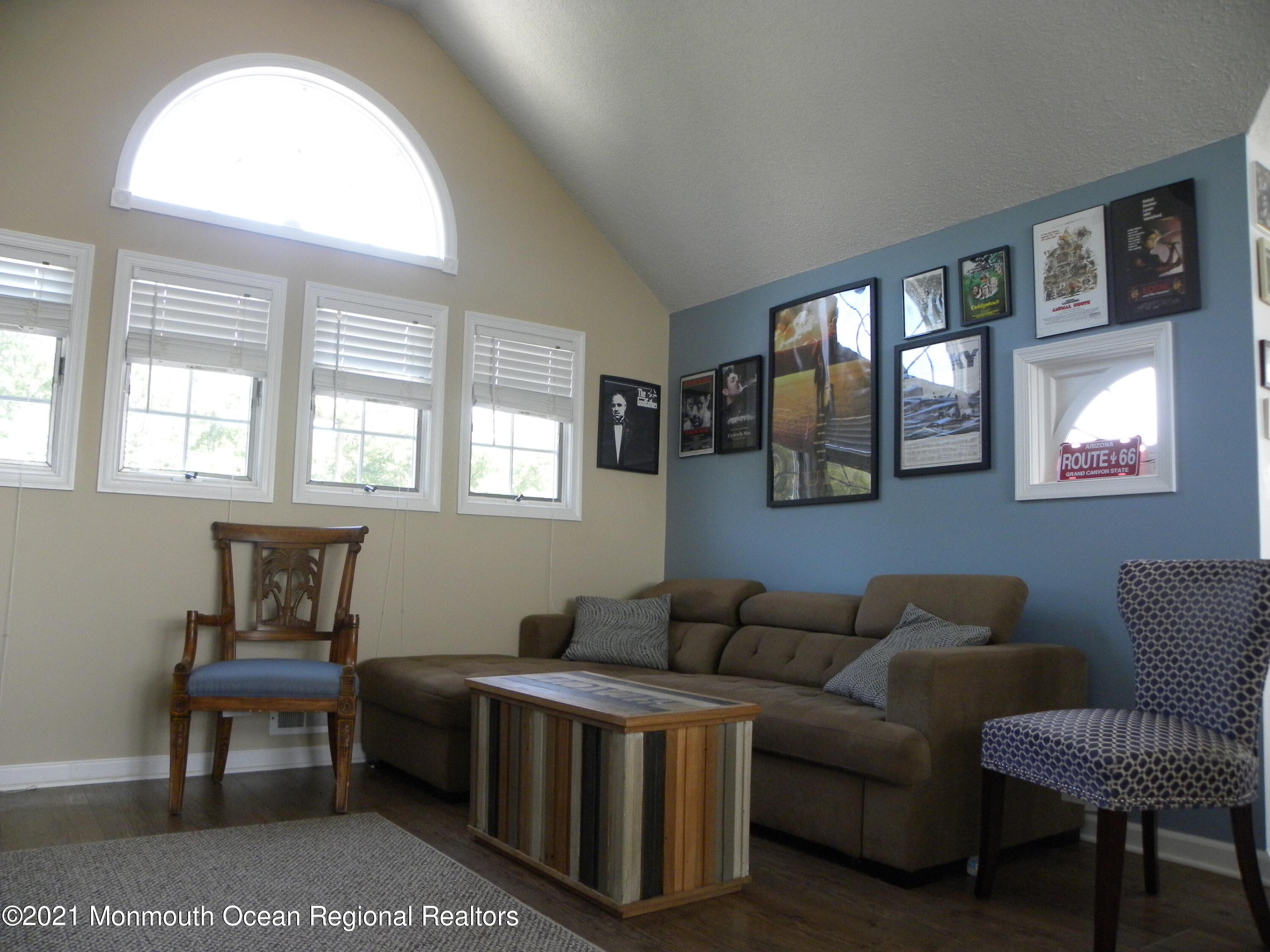 337 Lacey Road, Unit 37 Forked River, NJ 08731 - Photo 19 of 34 a living room with furniture a lamp and a potted plant