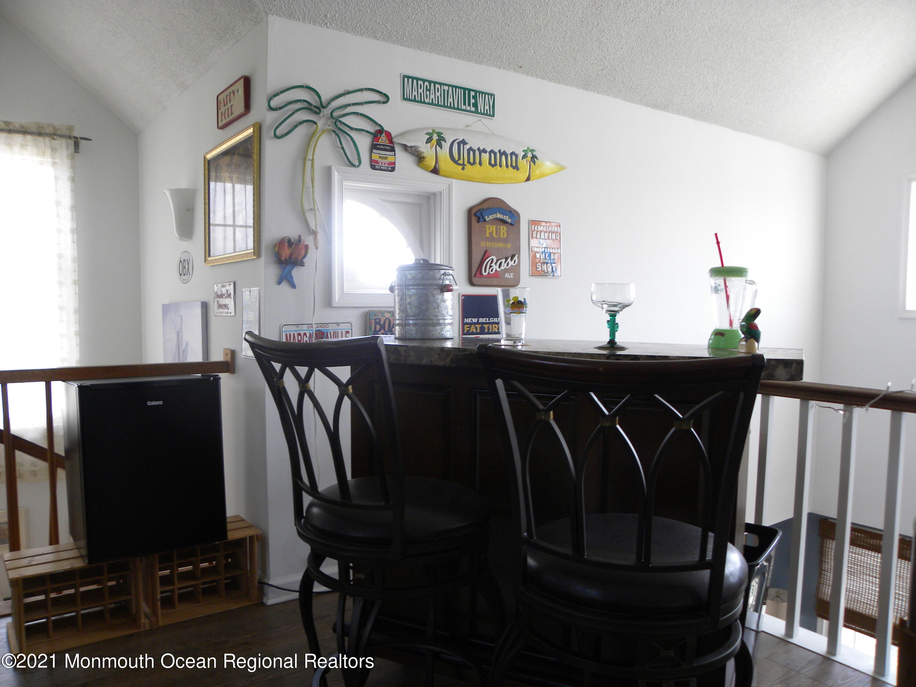 337 Lacey Road, Unit 37 Forked River, NJ 08731 - Photo 23 of 34 a dining room with furniture and window