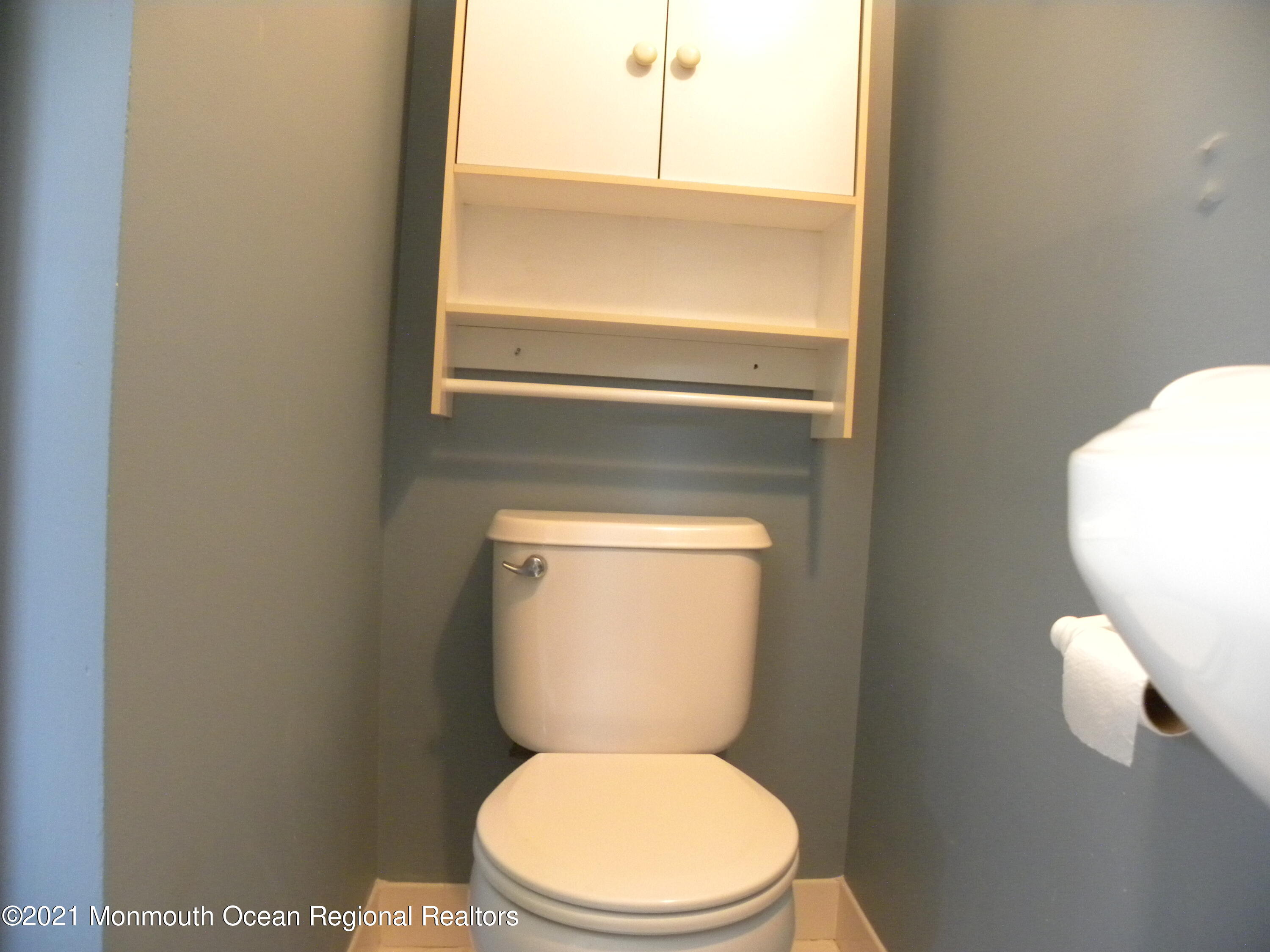 337 Lacey Road, Unit 37 Forked River, NJ 08731 - Photo 27 of 34 a white toilet sitting next to a window