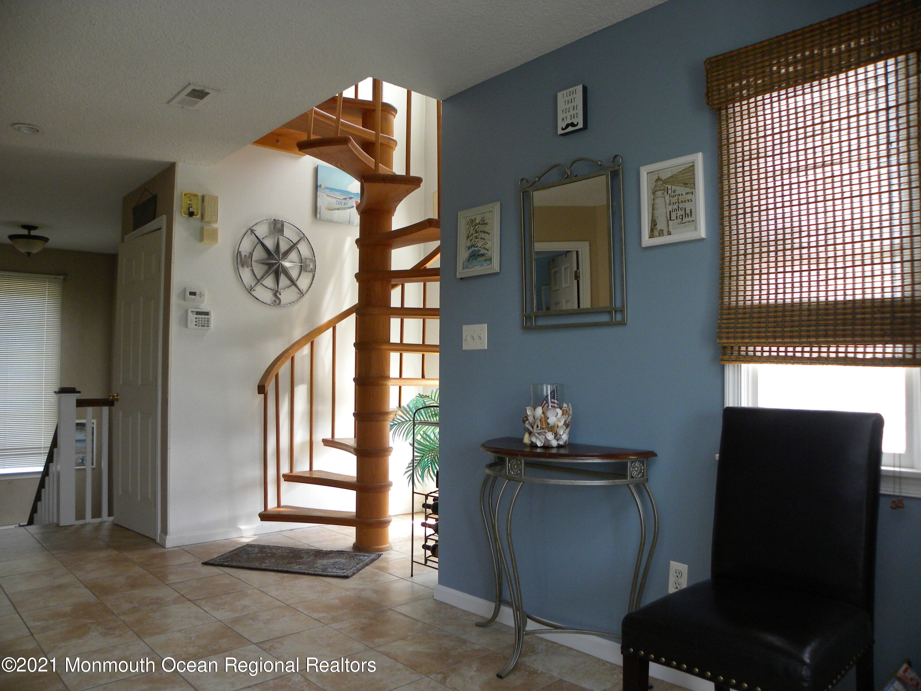 337 Lacey Road, Unit 37 Forked River, NJ 08731 - Photo 10 of 34 a view of a hallway with workspace and a window
