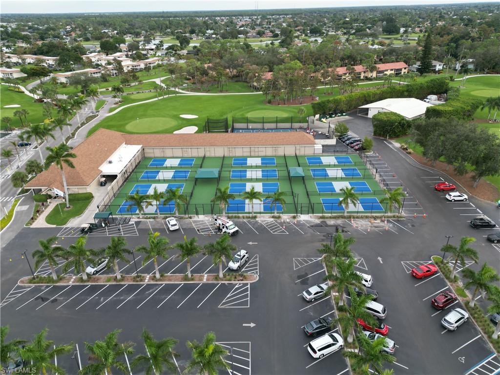 256 Palm Drive, Unit 6 Naples, FL 34112 - Photo 22 of 27 an aerial view of residential houses with outdoor space and street view