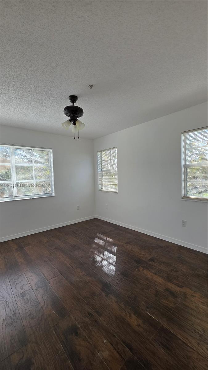 2090 West Preserve Way, Unit 301 Miramar, FL 33025 - Photo 12 of 21 a view of an empty room with a window