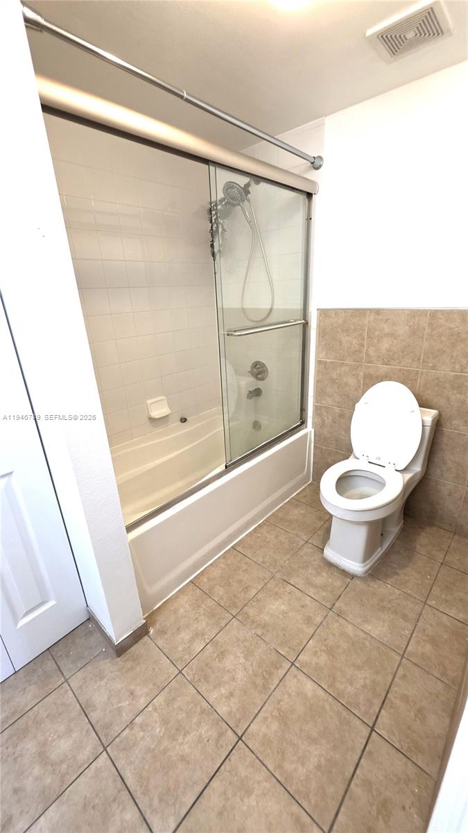 2090 West Preserve Way, Unit 301 Miramar, FL 33025 - Photo 15 of 21 a bathroom with a toilet and a shower
