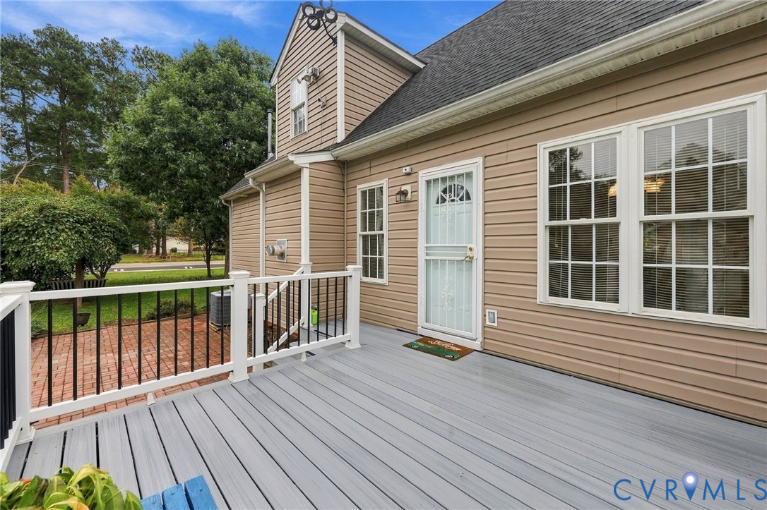 244 East Huntsman Road Sandston, VA 23150 - Photo 52 of 54 Exterior with beige siding, white-framed windows,
