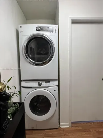 a utility room with dryer and washer