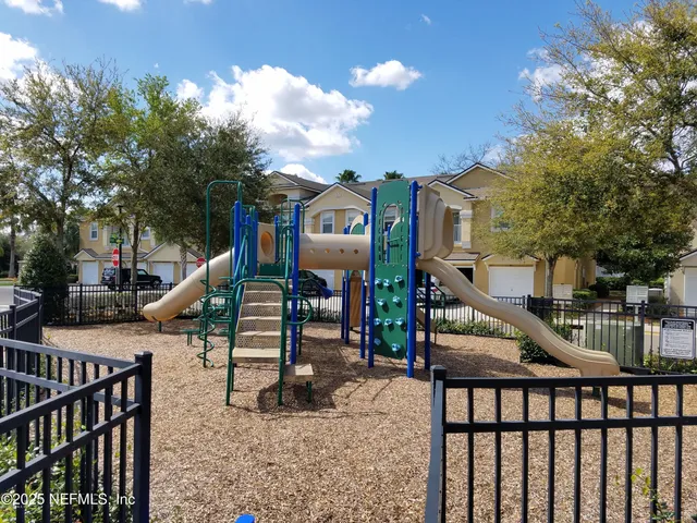 a view of a house with a park