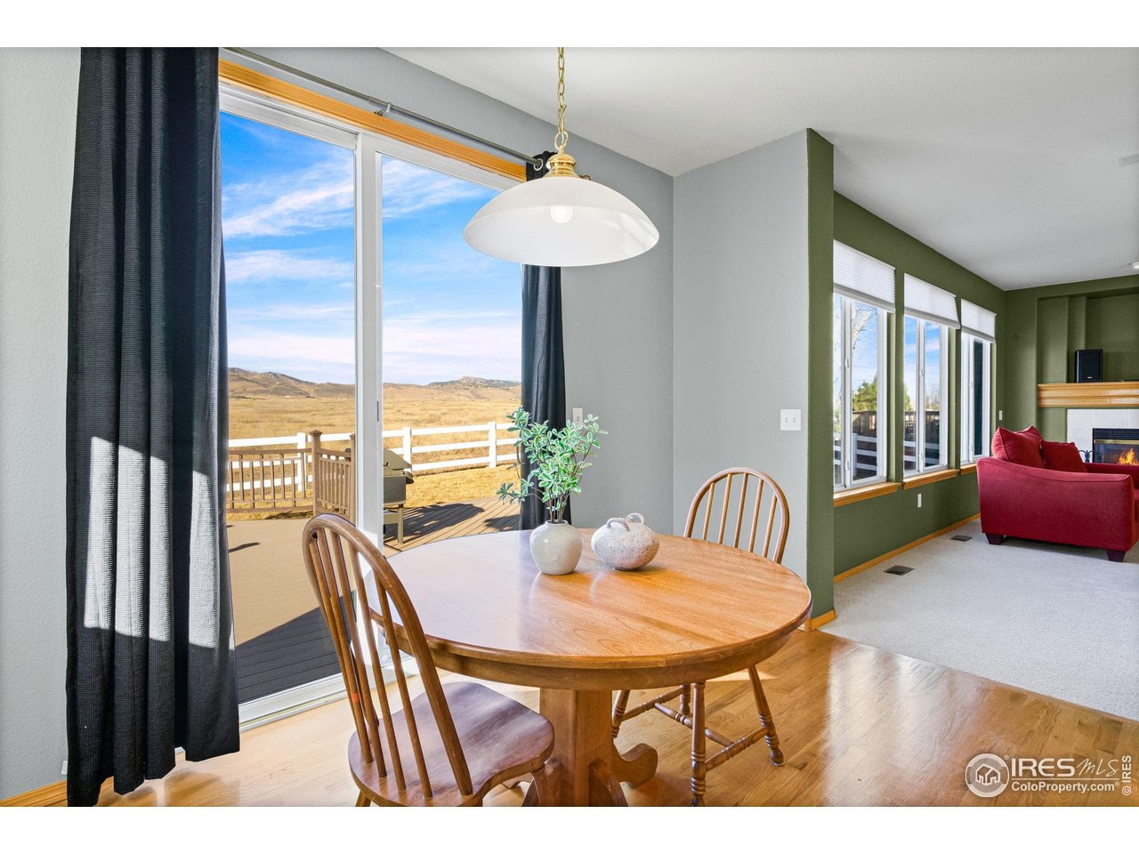 7133 Ranger Drive Fort Collins, CO 80526 - Photo 12 of 33 a view of a dining room with furniture window and outside view