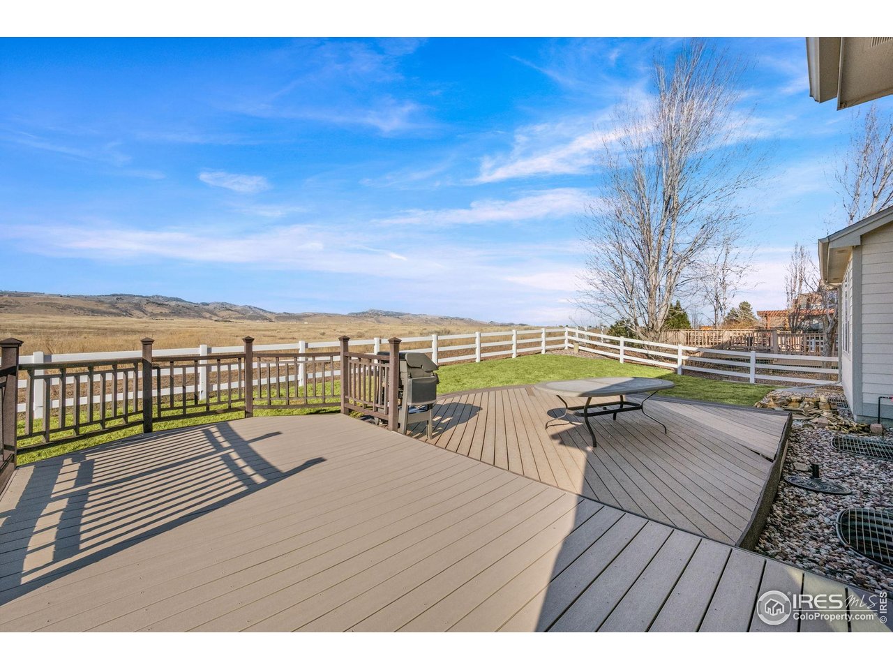 7133 Ranger Drive Fort Collins, CO 80526 - Photo 26 of 33 a view of ocean with a table and chairs
