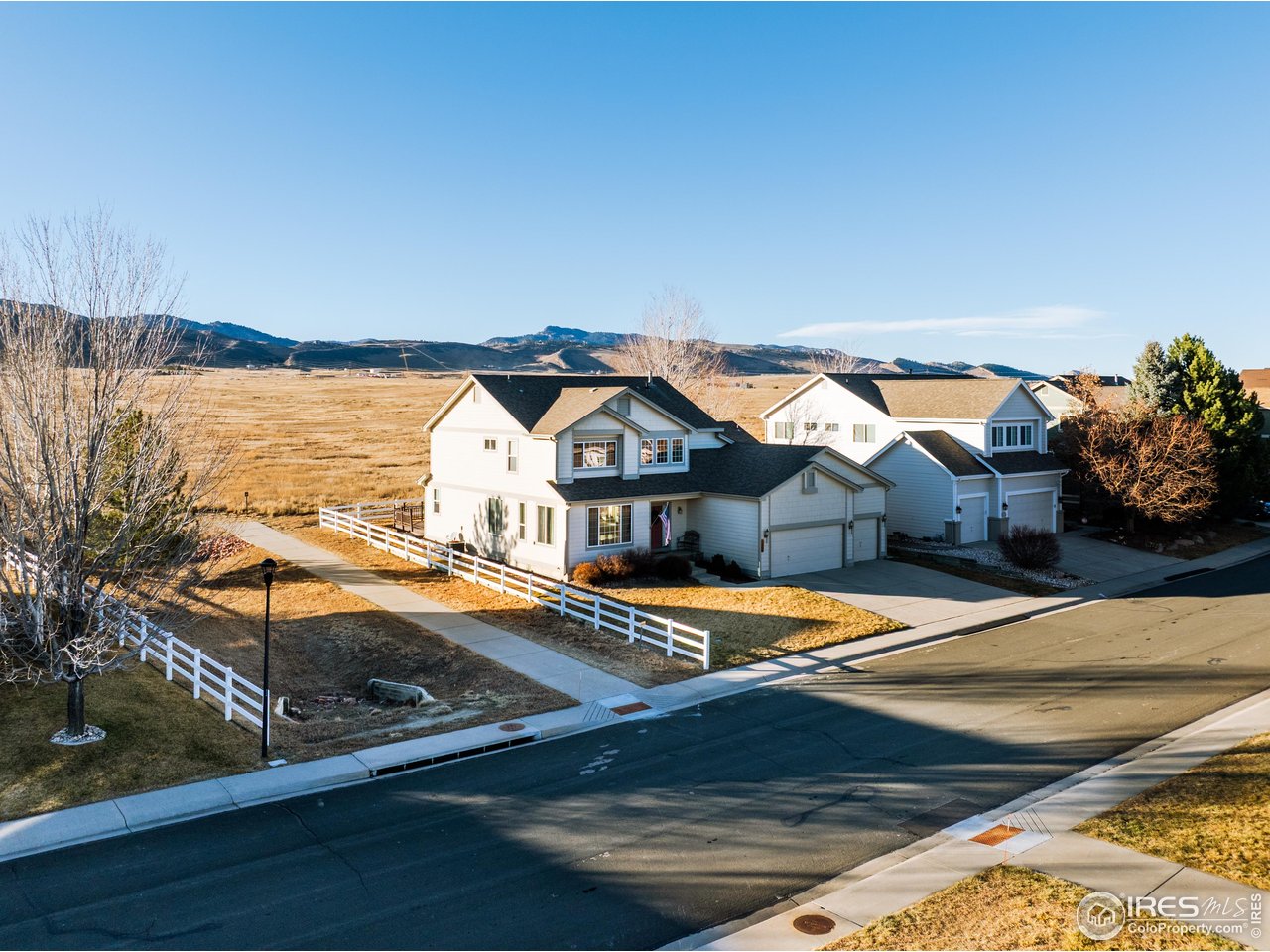 7133 Ranger Drive Fort Collins, CO 80526 - Photo 5 of 33 a view of a house with yard and balcony