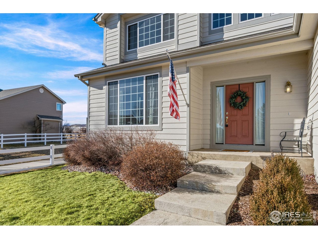 7133 Ranger Drive Fort Collins, CO 80526 - Photo 6 of 33 a front view of a house with garden