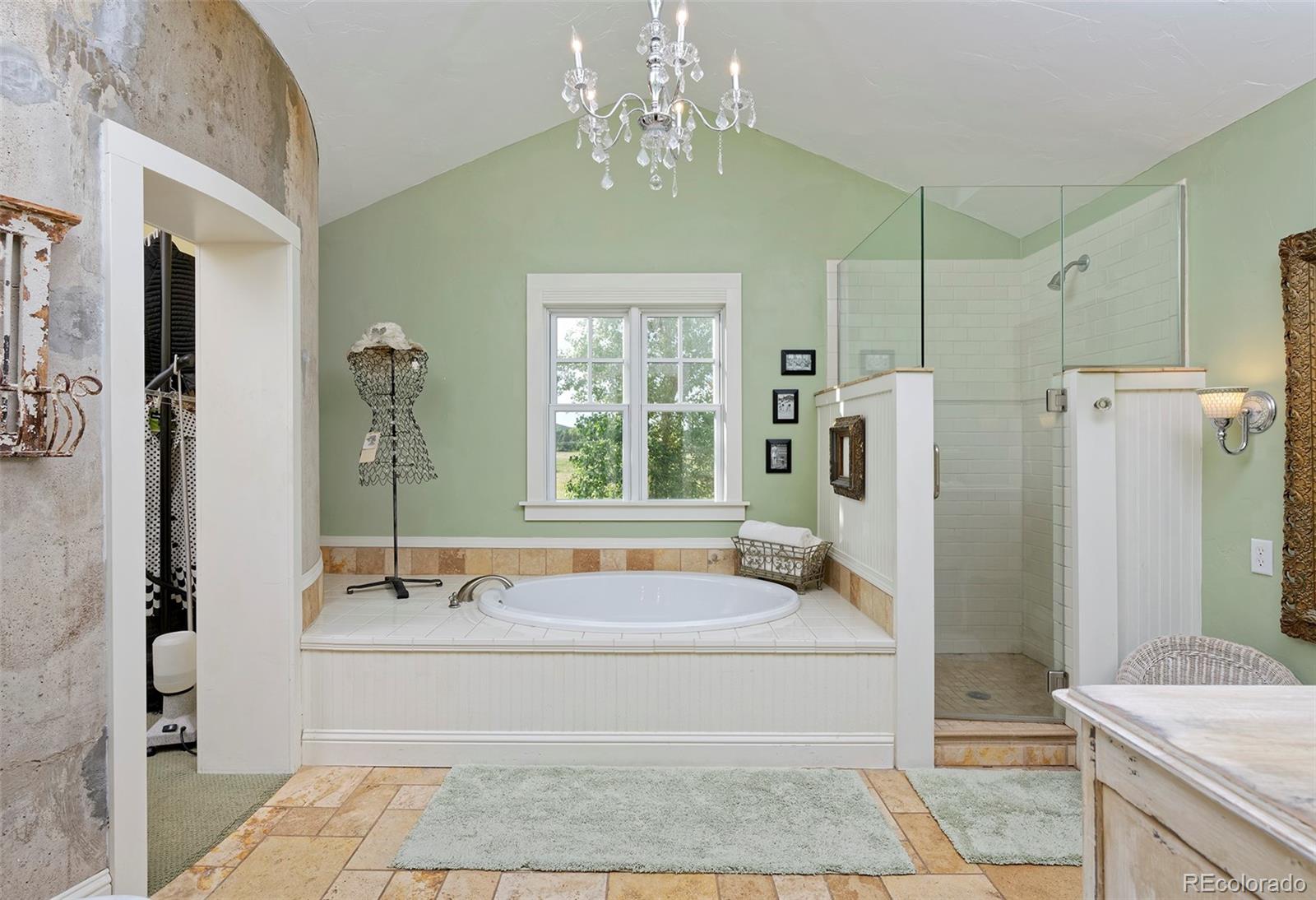 5875 Monarch Road Longmont, CO 80503 - Photo 21 of 38 a spacious bathroom with sink shower and bathtub