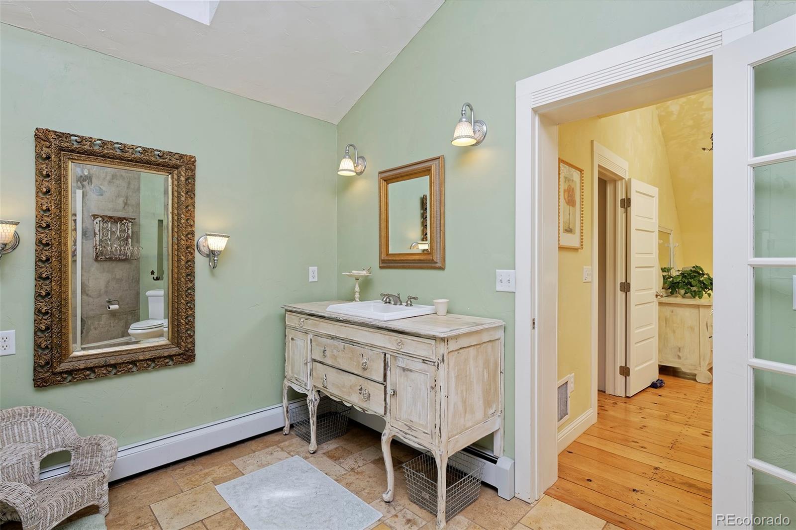 5875 Monarch Road Longmont, CO 80503 - Photo 23 of 38 a room with a table and chairs