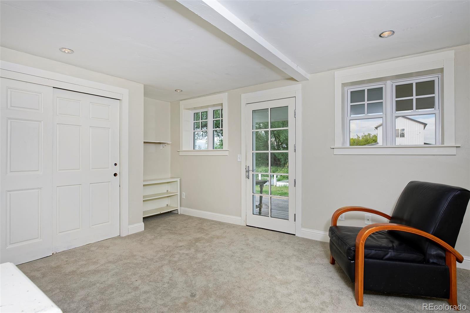 5875 Monarch Road Longmont, CO 80503 - Photo 26 of 38 a view of workspace with furniture and windows