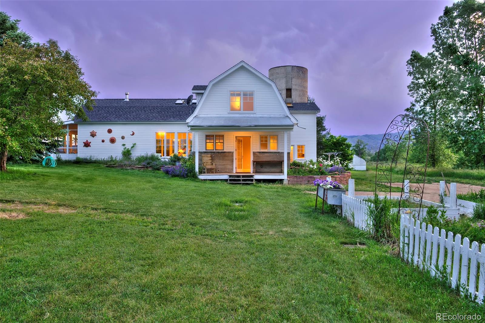 5875 Monarch Road Longmont, CO 80503 - Photo 3 of 38 a front view of house with yard and green space