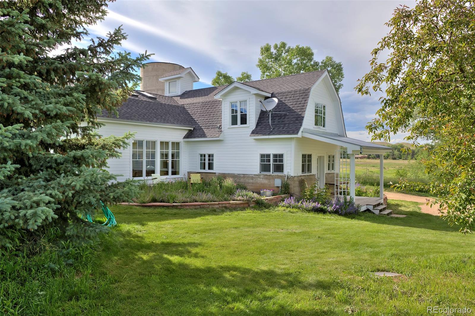 5875 Monarch Road Longmont, CO 80503 - Photo 31 of 38 a view of house with yard and green space