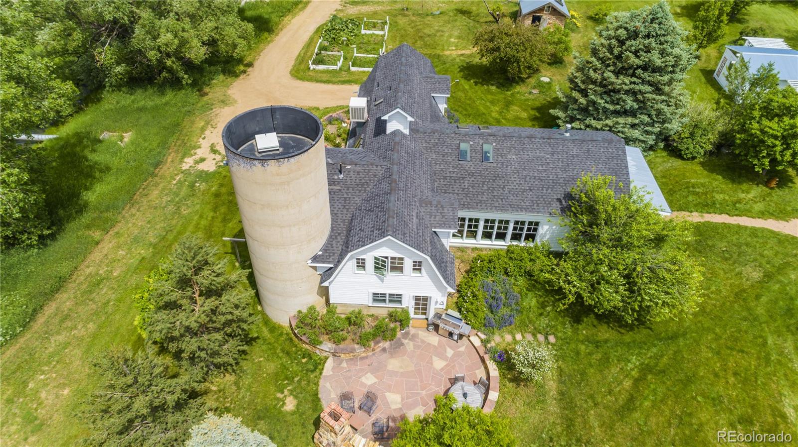 5875 Monarch Road Longmont, CO 80503 - Photo 32 of 38 an aerial view of a house with a garden and yard