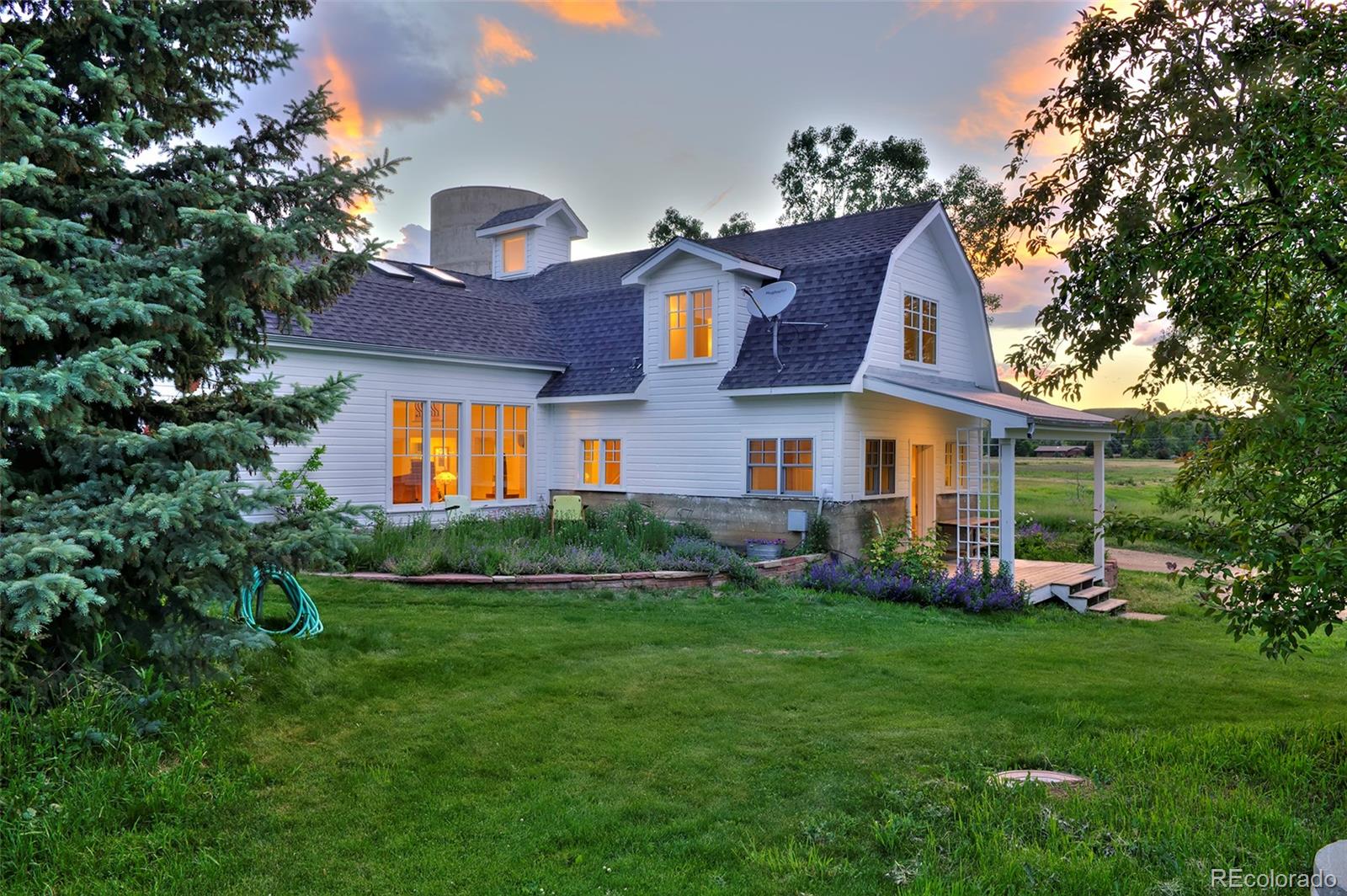 5875 Monarch Road Longmont, CO 80503 - Photo 4 of 38 a front view of house with yard and green space