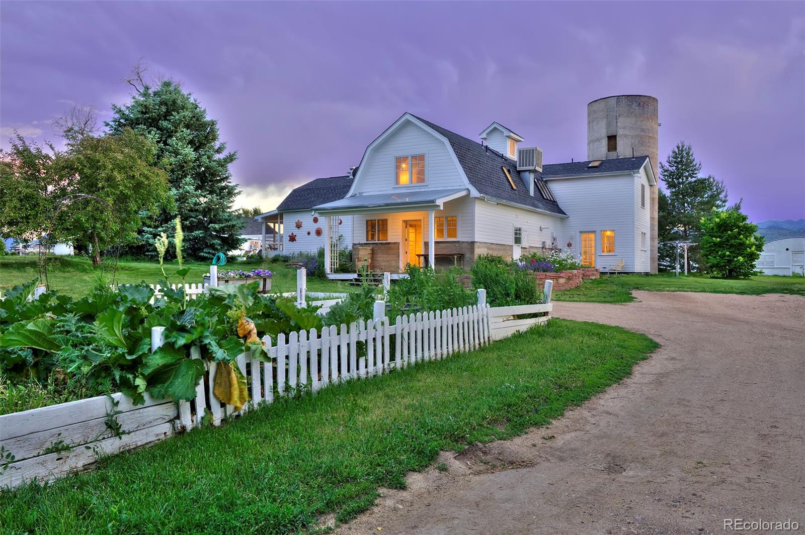 5875 Monarch Road Longmont, CO 80503 - Photo 5 of 38 a front view of house with yard and green space