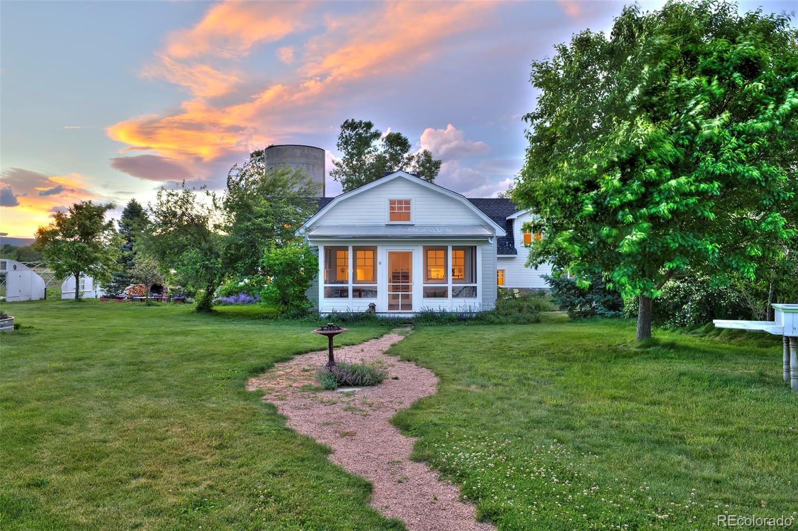 5875 Monarch Road Longmont, CO 80503 - Photo 6 of 38 a front view of a house with a yard