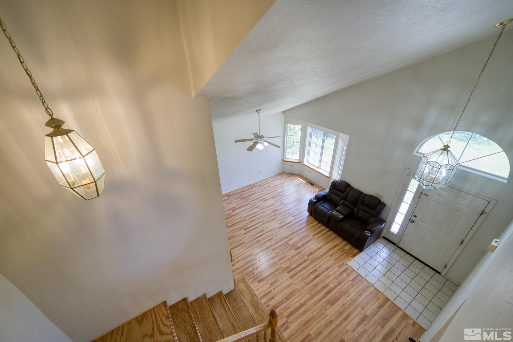 610 Sunset Drive Fallon, NV 89406 - Photo 19 of 36 a living room with furniture and a wooden floor