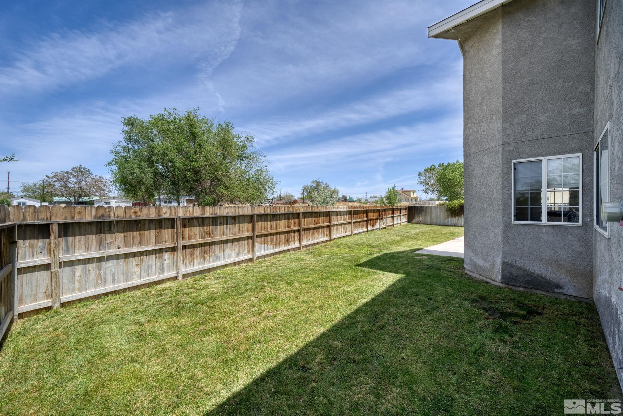 610 Sunset Drive Fallon, NV 89406 - Photo 35 of 36 a view of an outdoor space and a yard