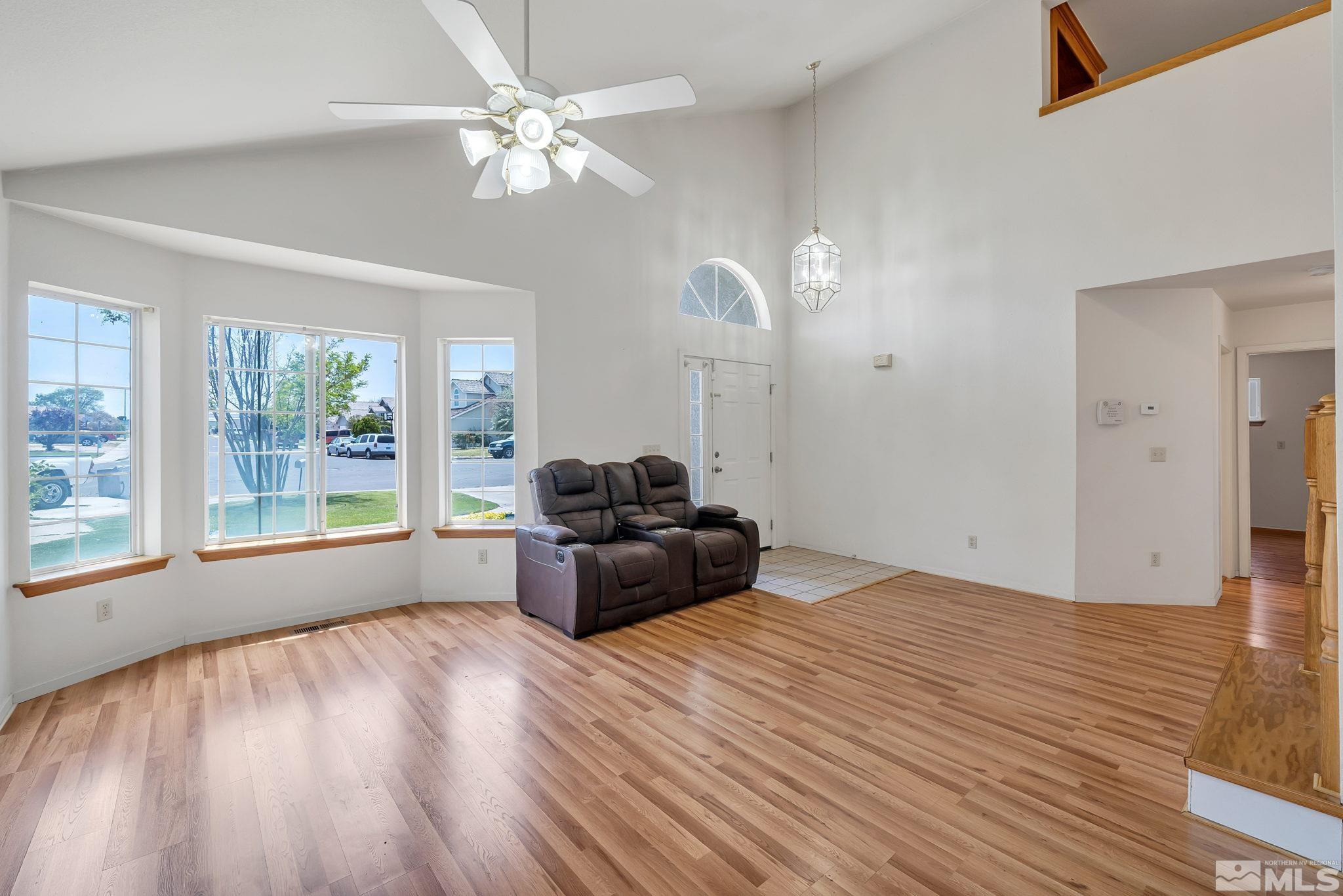 610 Sunset Drive Fallon, NV 89406 - Photo 5 of 36 a living room with furniture and a large window