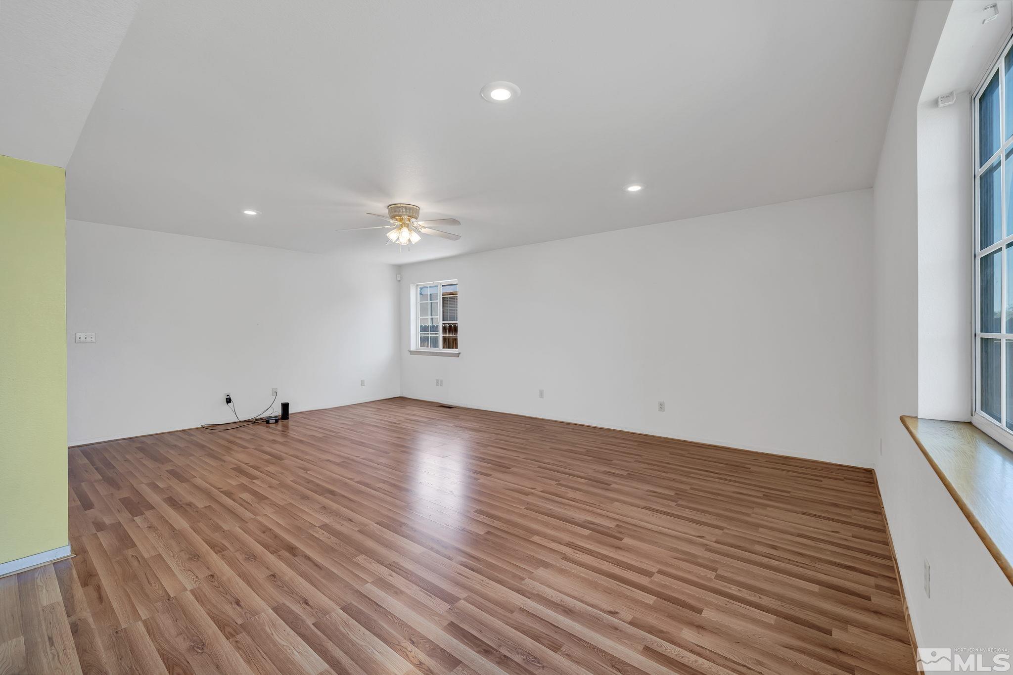 610 Sunset Drive Fallon, NV 89406 - Photo 10 of 36 a view of a room with wooden floor and window