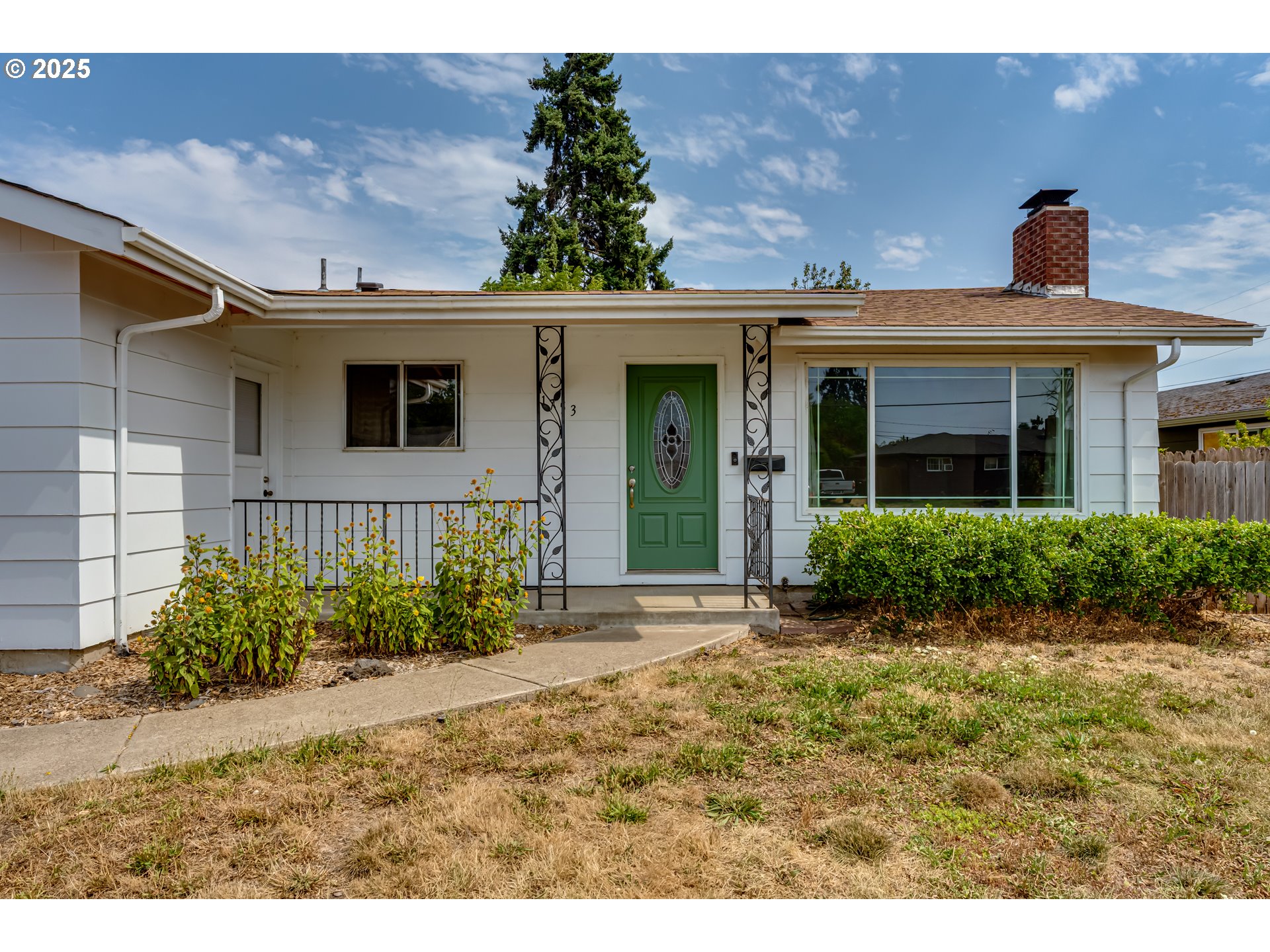 1753 10th Street Springfield, OR 97477 - Photo 3 of 35 a view of a front of a house with a yard