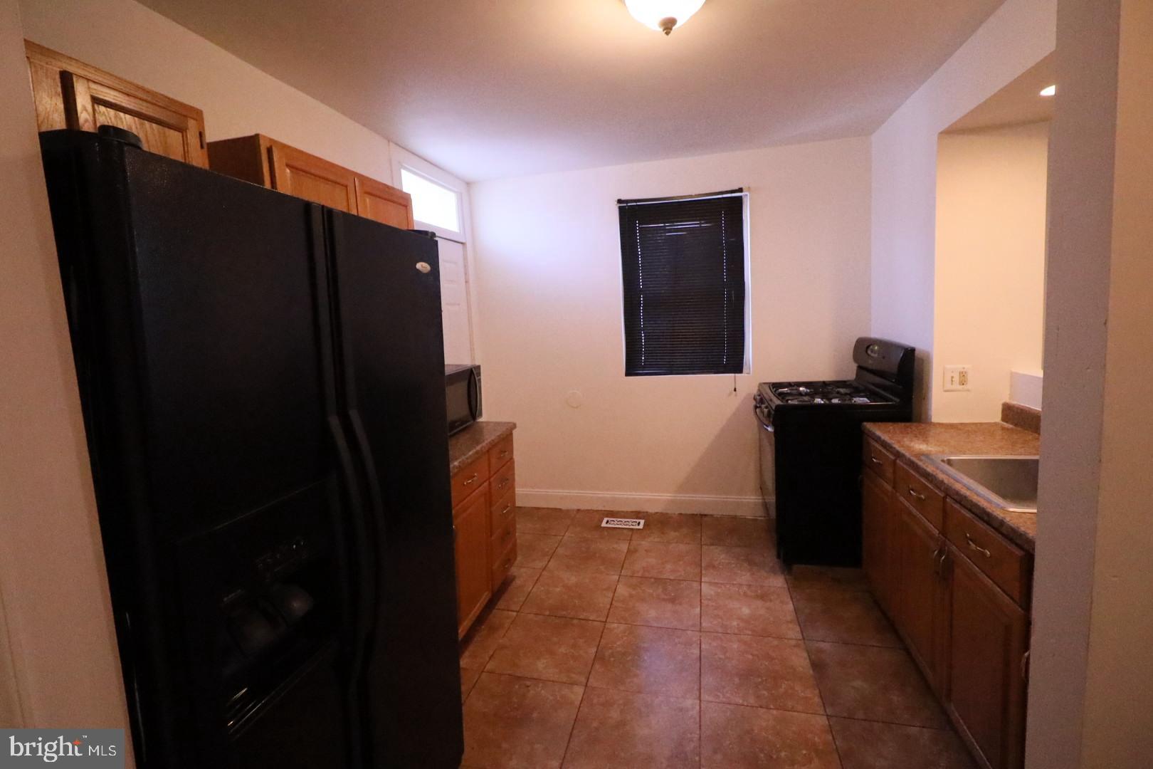 5233 Cuthbert Avenue Baltimore, MD 21215 - Photo 3 of 9