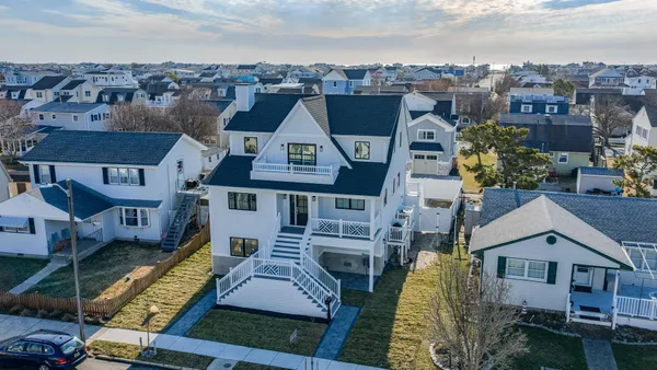 an aerial view of residential building with outdoor space