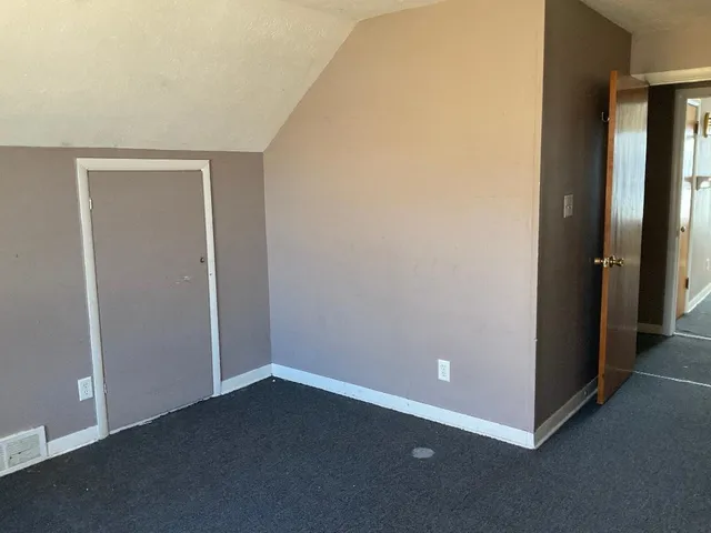 an empty room with closet