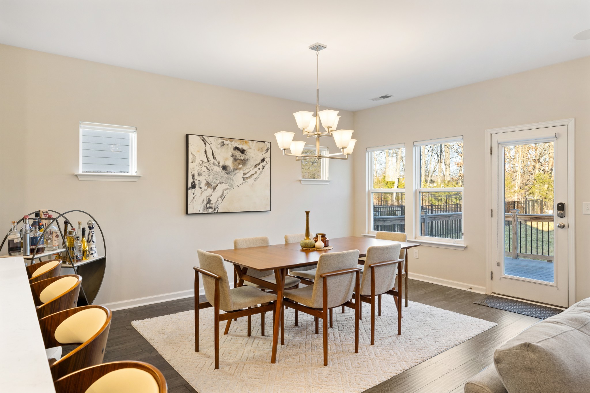 633 Castle Road Mount Juliet, TN 37122 - Photo 8 of 30 a dining room with furniture a rug and a chandelier