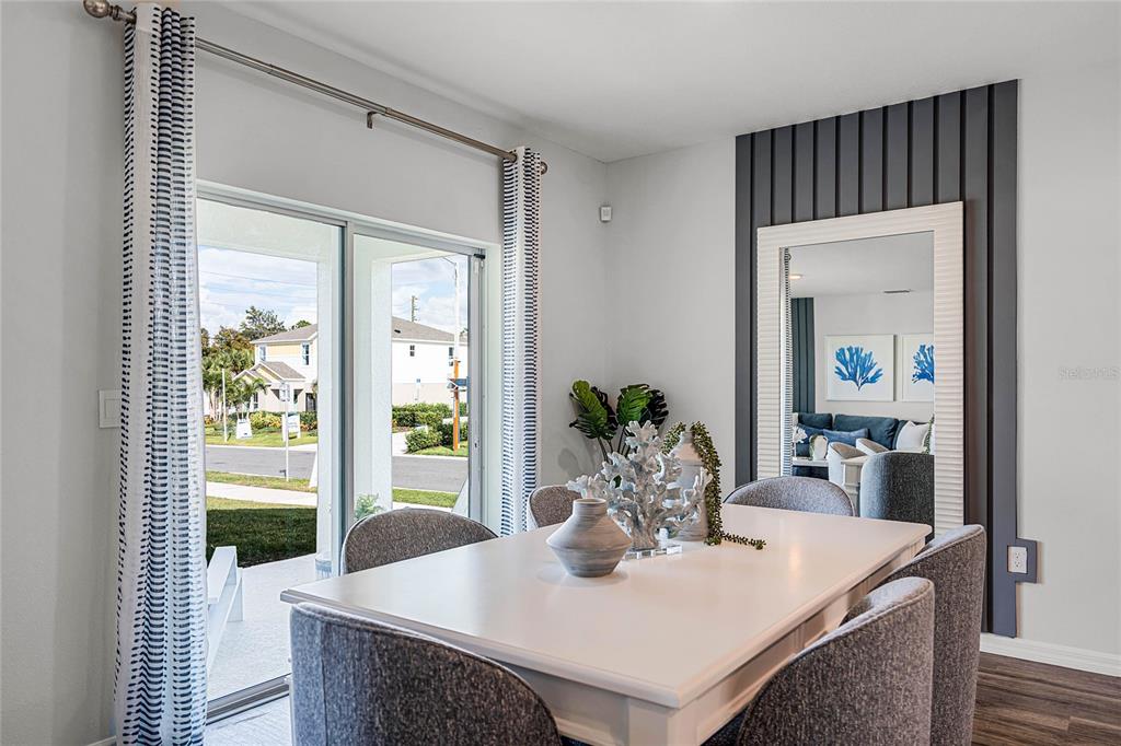 3514 Roden Road Haines City, FL 33844 - Photo 14 of 35 a dining room with furniture and wooden floor