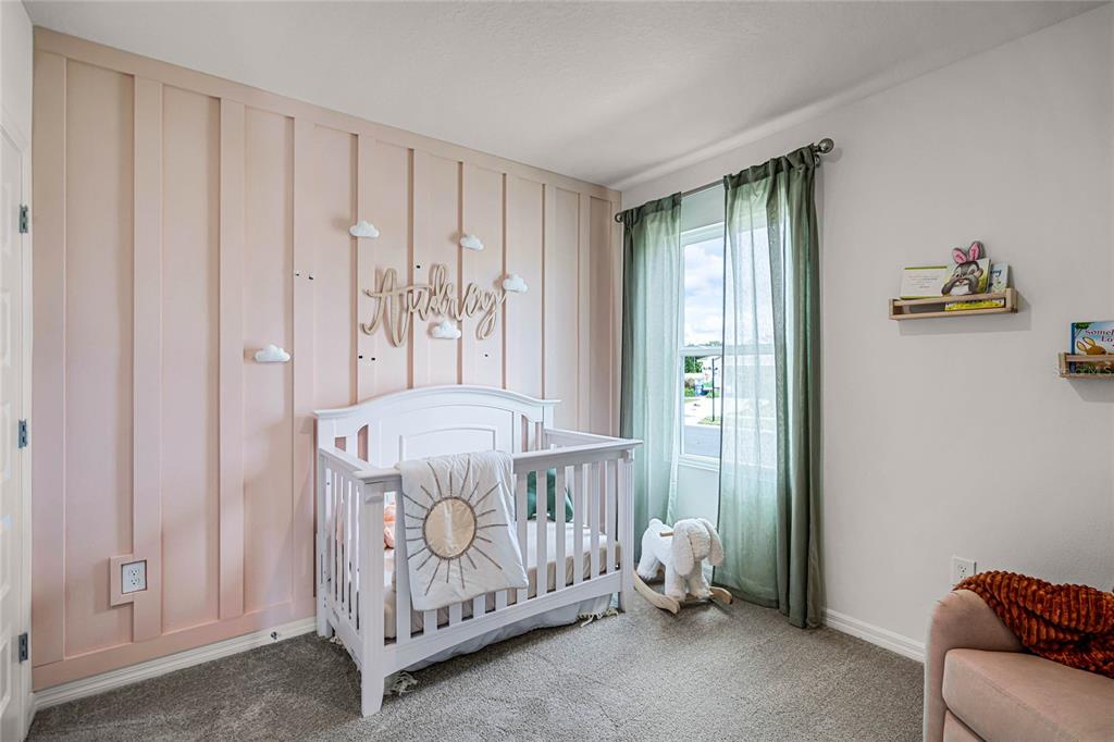 3514 Roden Road Haines City, FL 33844 - Photo 31 of 35 a bedroom with a bed and a window