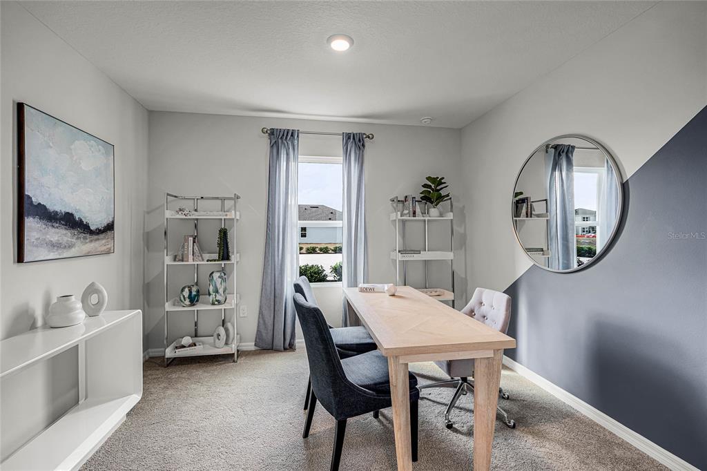 3514 Roden Road Haines City, FL 33844 - Photo 33 of 35 a view of a dining room with furniture and a mirror